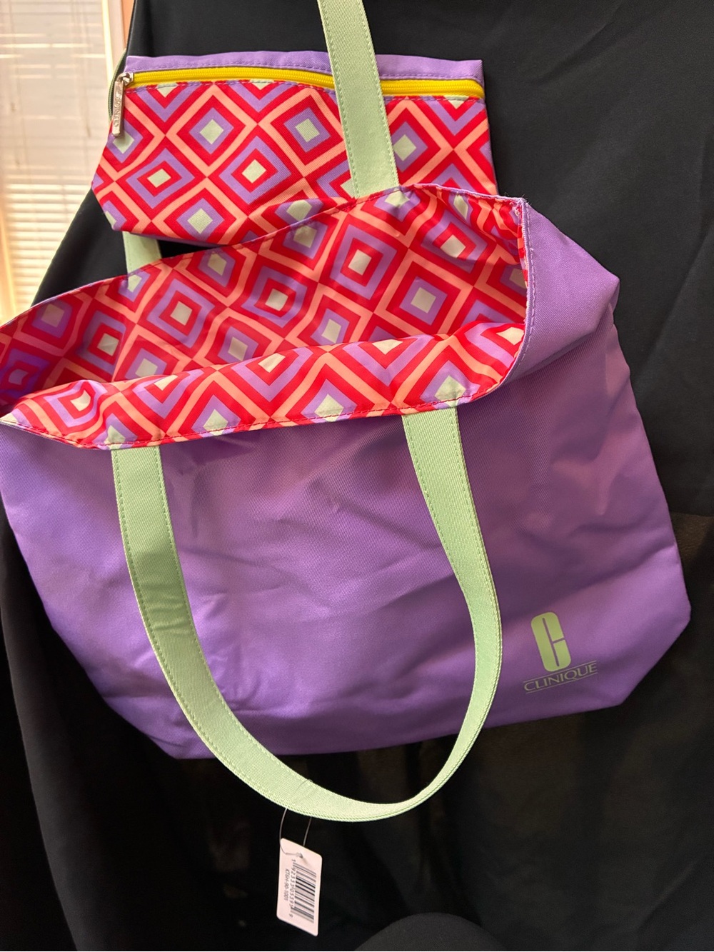 Clinique Purple Tote with Light Green Straps and Pink Geometric Liner